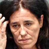 Әйел екі жыл бойы қызын жүк салғышта қамап келген