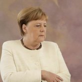 «Ангела Меркель неге дірілдейді?» Неміс дәрігері жауап берді (ВИДЕО)