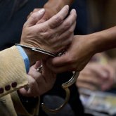 Алматы облысында екі шенеуніктің қолына кісен салынды