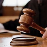 Алматыда әйелдің басын кесіп алды деген күдікке ілінген ер адам сотта жылап жіберді