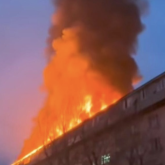 Астана әкімі кездесуге бармаған көпқабатты үйдің төбесі жанып кетті (ВИДЕО)