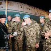 Әскери парадқа қатысқан жауынгерлер Мәскеуден оралды (ФОТО)