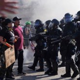 Ұлттық гвардия мен мигранттар қақтығысы: АҚШ азаматтық соғыс алдында тұр ма?