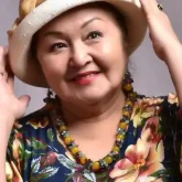 Тойда ән айтып, билеген Лидия Кәденова желіні жарды (ВИДЕО)