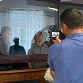 Атыраудағы отбасы өлімі: Сотта ерлі-зайыпты көмілген жерден кадрлар көрсетілді