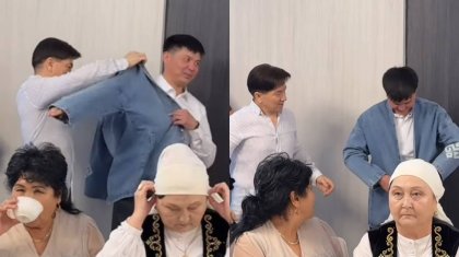 «Жағалы тон қайда?»: Жаңа құдаларына «джинсы» кит кигізген Сәкен Майғазиев сынға қалды