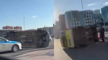 Астанада жедел жәрдемді аударып кеткен жол апаты: екі адам жарақат алды (ВИДЕО)
